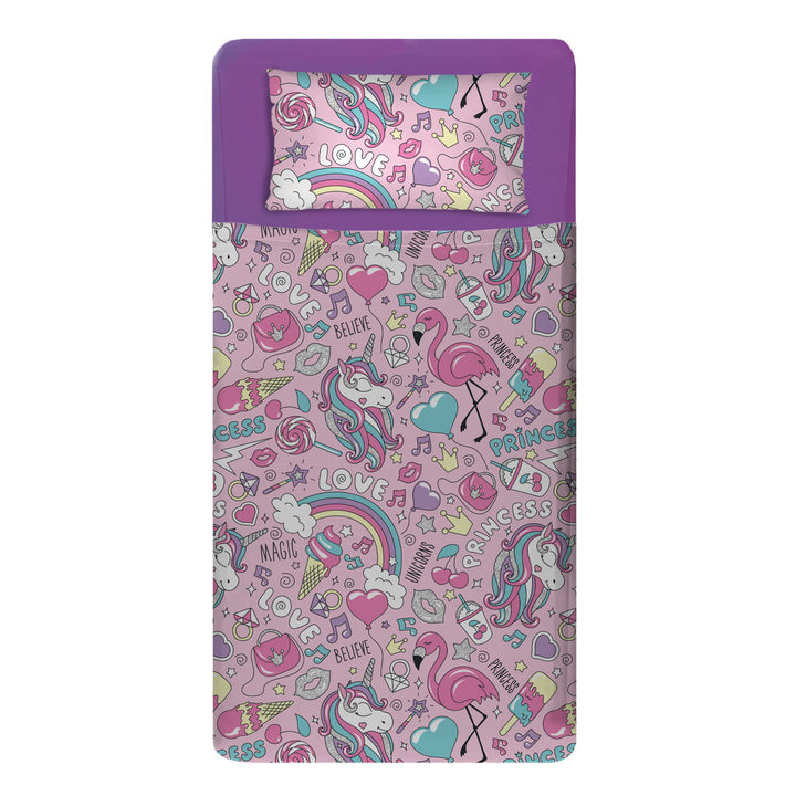 Made bed mattress image with sensory purple fitted sheets and pink princess and unicorn print compression Sheets