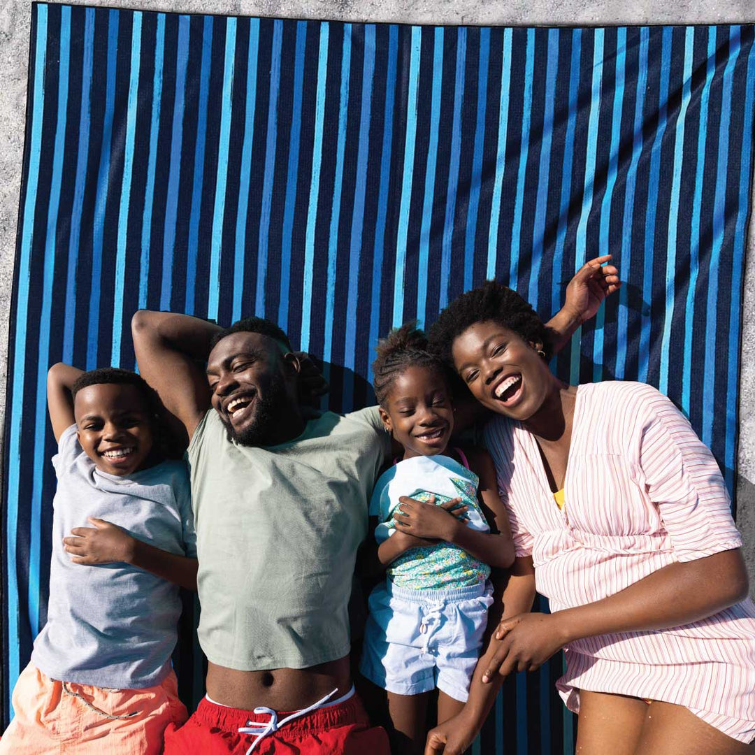 Beautiful happy family on sand Free Bondi Blue Beach towel by JettProof