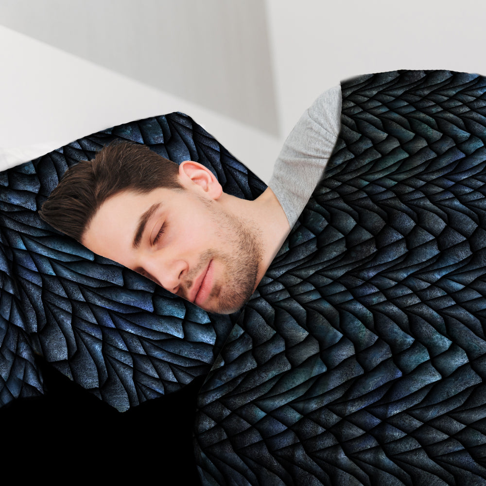 Man asleep in sensory Compression sheet sheets with dragon scale print