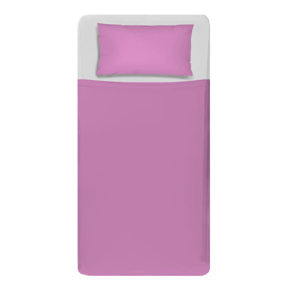 Made bed mattress image with sensory white fitted sheets and pink compression sheets