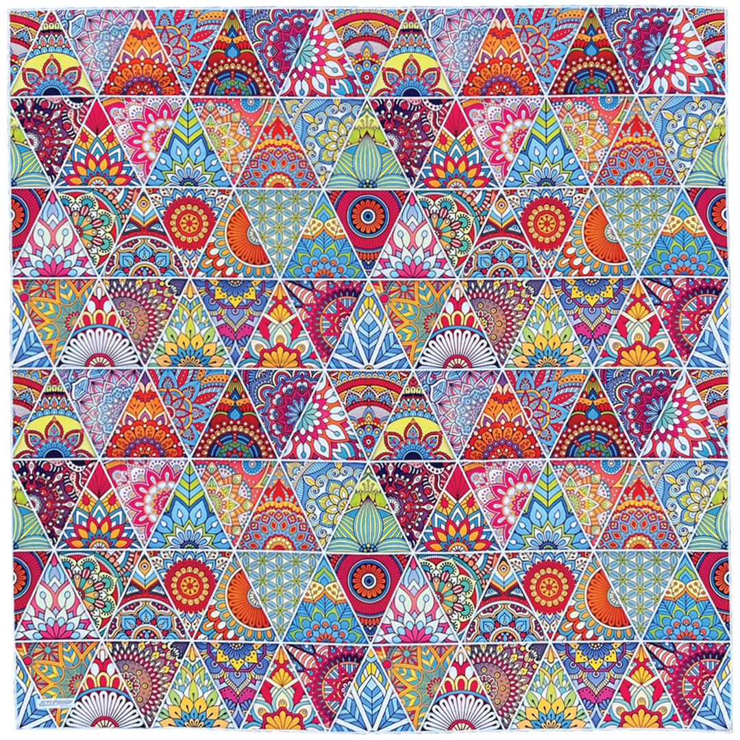 Laid out oversized sand-free towel featuring beautiful interlocking triangle patterns in vibrant pink orange blue and green