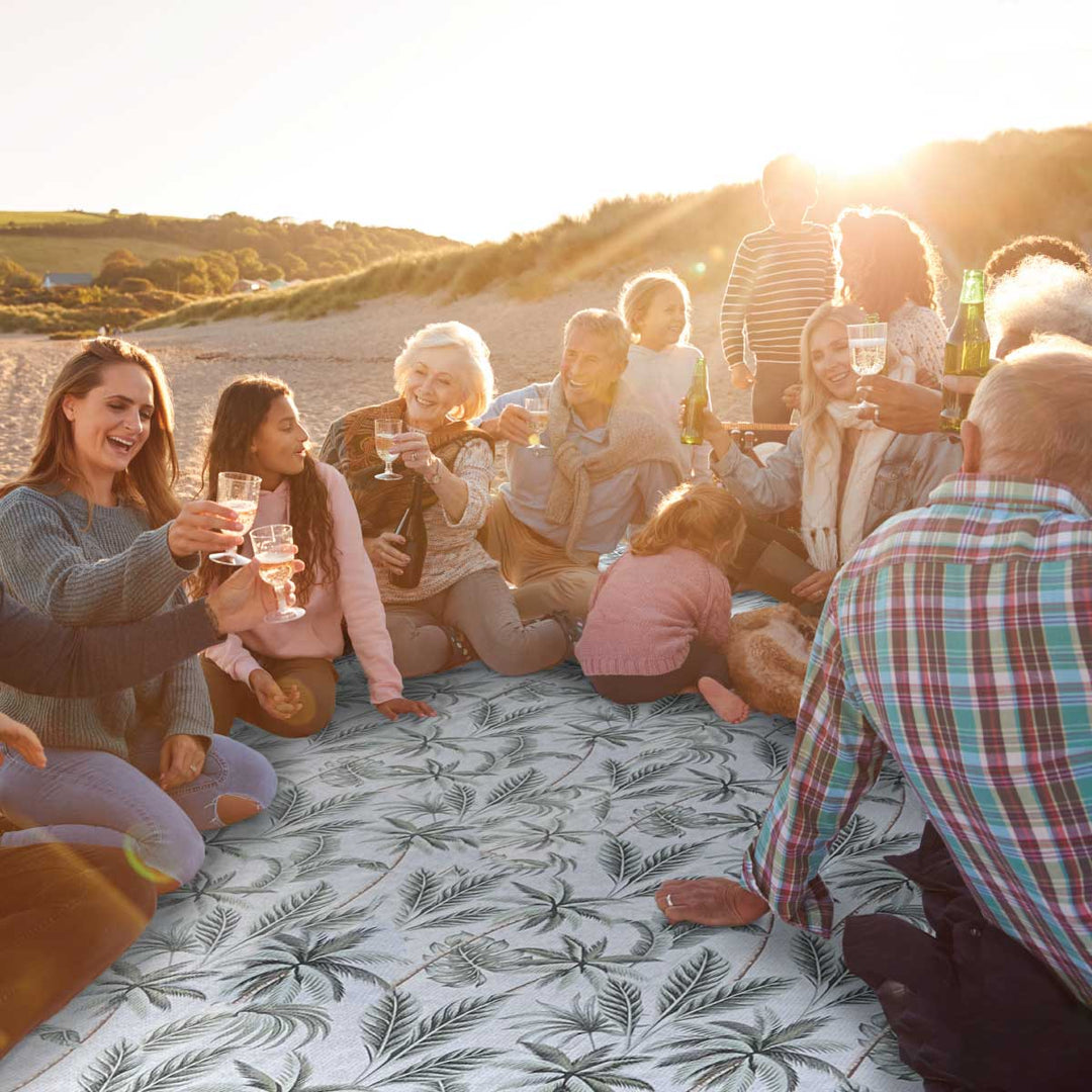 Beautiful, happy family quality time on beach at sunset with Extra-Large Jumbo size Sand Free Towel