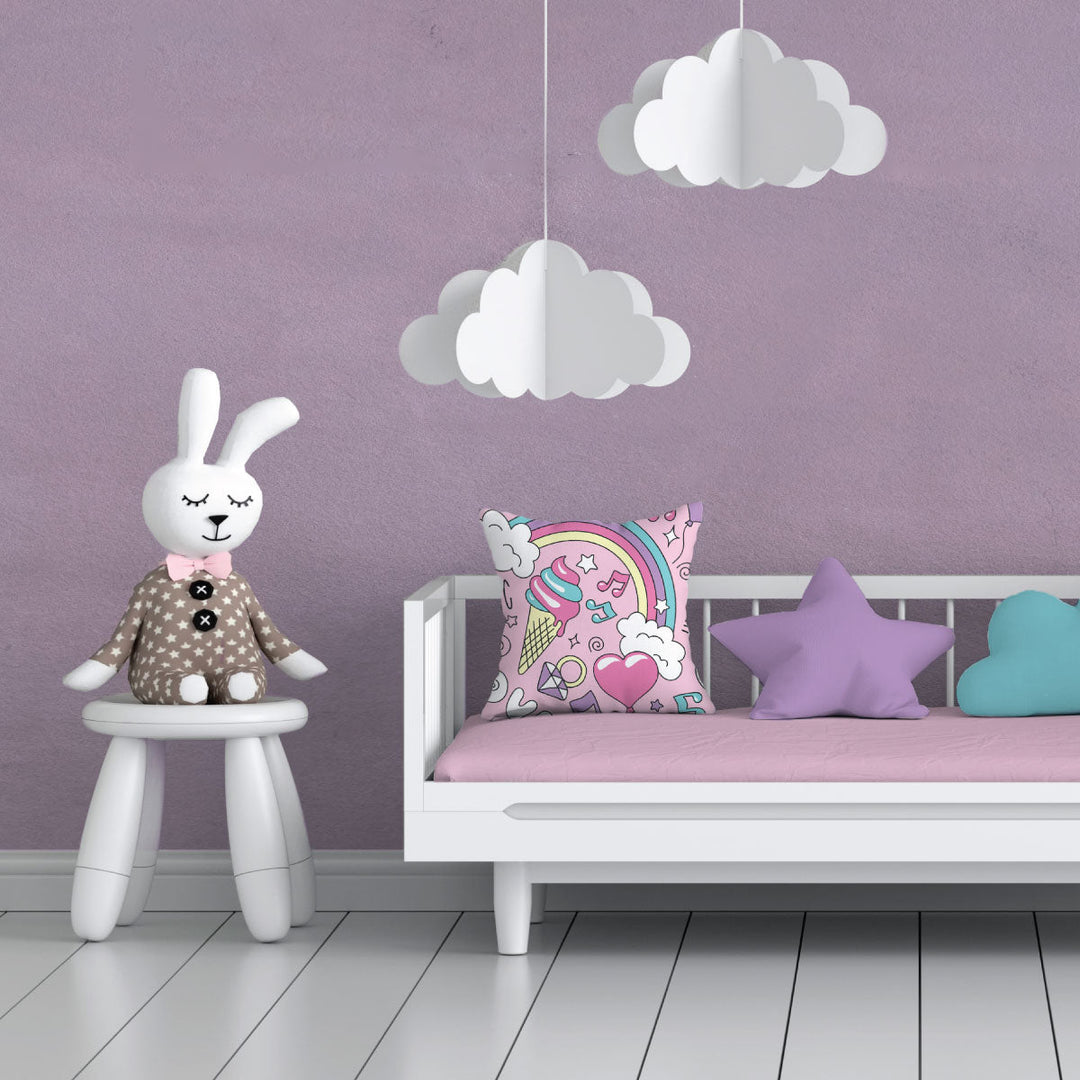 Girly childs room with fake clouds and princess cushion with Ice Cream